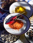 Various spices on plates