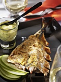 Grilled mackerel on apple slices