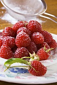 Raspberries with icing sugar