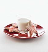 Star-shaped biscuits with a glass of milk