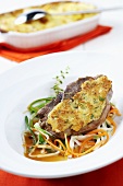 Lamb chop with cheese topping