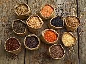 Various types of lentils in paper bags