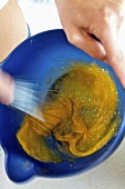 Beating egg yolk and sugar