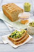 Bread with various spreads: avocado, pepper and cheese