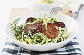 Creamed savoy cabbage with fried bacon and black pudding