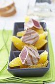Grilled tuna with orange segments
