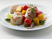 Grilled scallops with tomato and mango salad