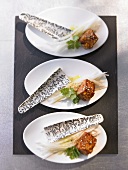 Salmon appetisers marinated with orange and soy sauce