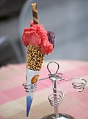 Raspberry ice cream in cone