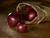 Red onions with paper bag