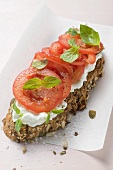 Soft cheese and tomatoes on bread