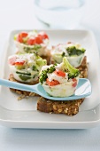 Egg and vegetable muffins on toasted wholemeal bread