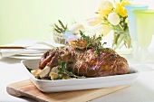Roast lamb shank with herbs for Easter