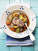 Bouillon with pork fillet, root vegetables and potatoes