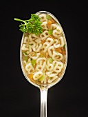 Alphabet soup in spoon