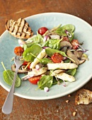 Spinach, asparagus, mushroom and cherry tomato salad