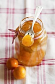 Kumquat compote in a jar