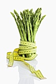 Green asparagus with tape measure