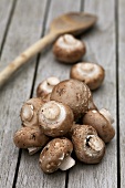 Chestnut mushrooms on wooden table