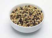 Seasoning mixture (fennel, pepper) in a small bowl