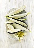Sliced aubergines with olive oil before grilling