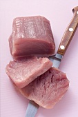 Pork fillet with meat knife