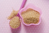 Brown sugar in pink dish