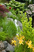 Marmonr Buddha in asiatischem Garten, Birma