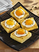 Several pieces of fried egg cake (with apricots)