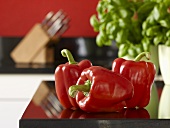 Red peppers on worktop in kitchen