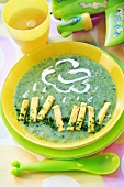 Herb soup with egg for children