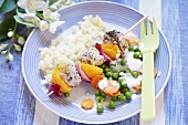 Colourful kebab with rice and vegetables for children