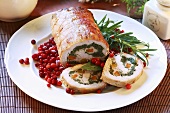Pork roulade with carrot and spinach filling
