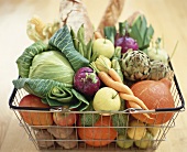 Vegetables, fruit and bread in basket