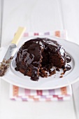 Chocolate pudding with chocolate sauce (UK)