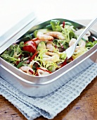 Summer salad with shrimps and avocado in lunch box