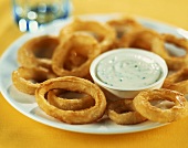 Deep-fried onion rings with dip