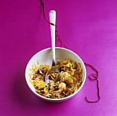 Rice with vegetables, pistachios and pomegranate seeds