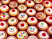 Many decorated cupcakes