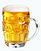 A pint of lager in a glass tankard