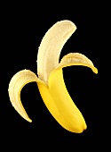 Half-peeled banana against black background