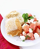 Feta and watermelon salad with bread roll