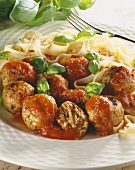 Meatballs with tomato sauce and ribbon pasta