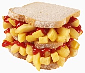 Double-decker chip butty with ketchup