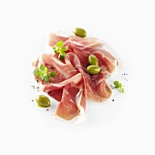 Parma ham with green olives