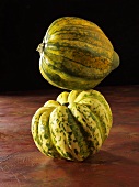 Two squashes, one on top of the other