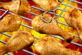 Chicken drumsticks on barbecue