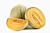 Cantaloupe melon and one cut into pieces