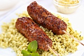 Mince kebabs on couscous