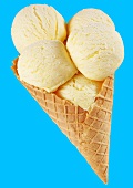 Five scoops of vanilla ice cream in a waffle cone